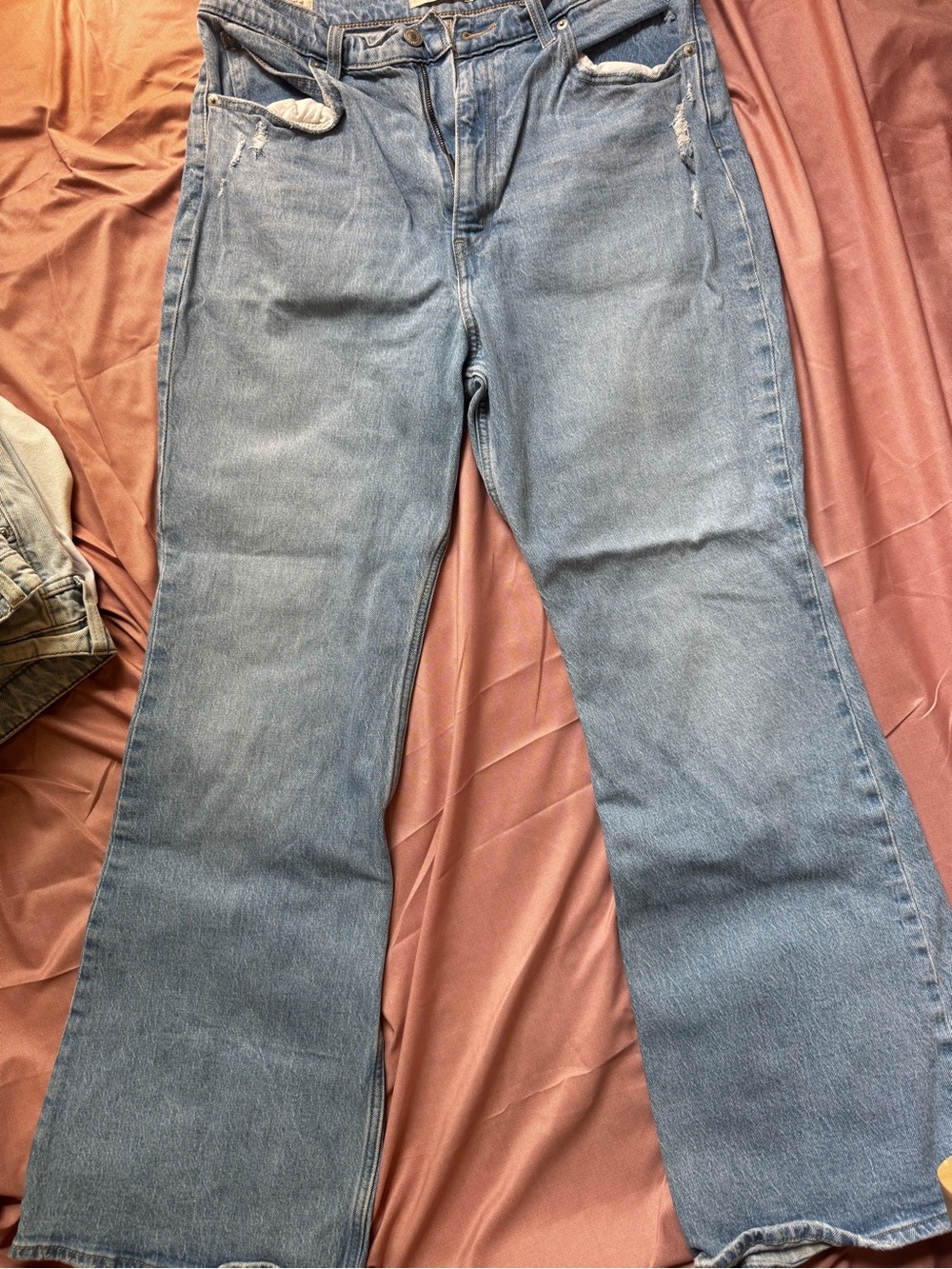 Levi's Light Blue Flare Jeans with Subtle Distress